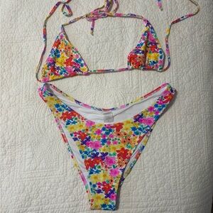 Bright swimwear melody top and capri bottoms in sunset colourway. Large